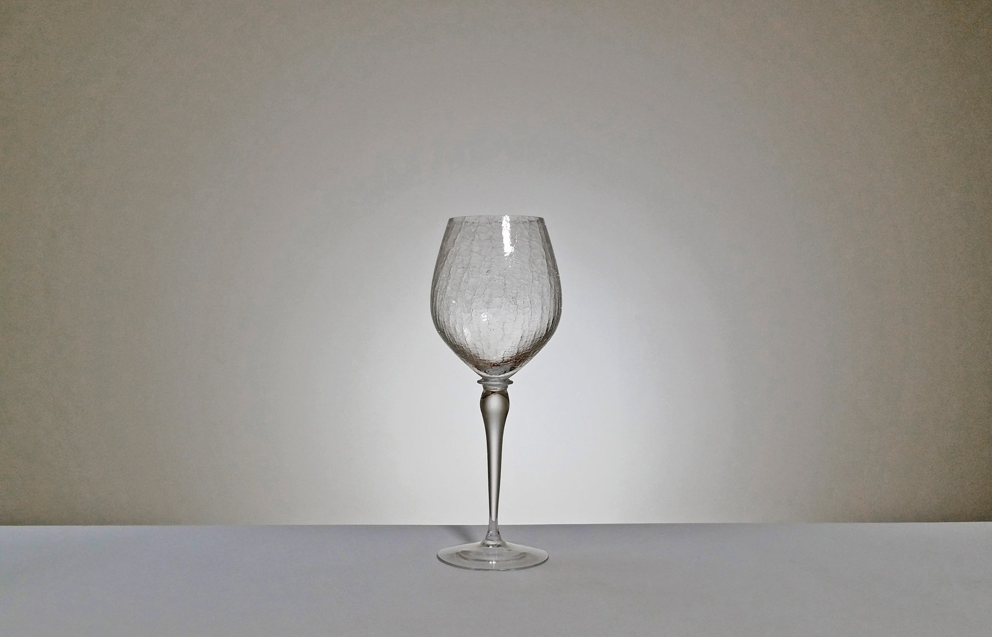 Crackled red wine glass